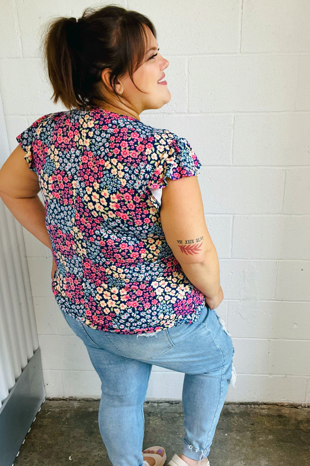 Navy Floral Print Frilled Shorts Sleeve Yoke Tops | Nikki &amp; Co. Boutique