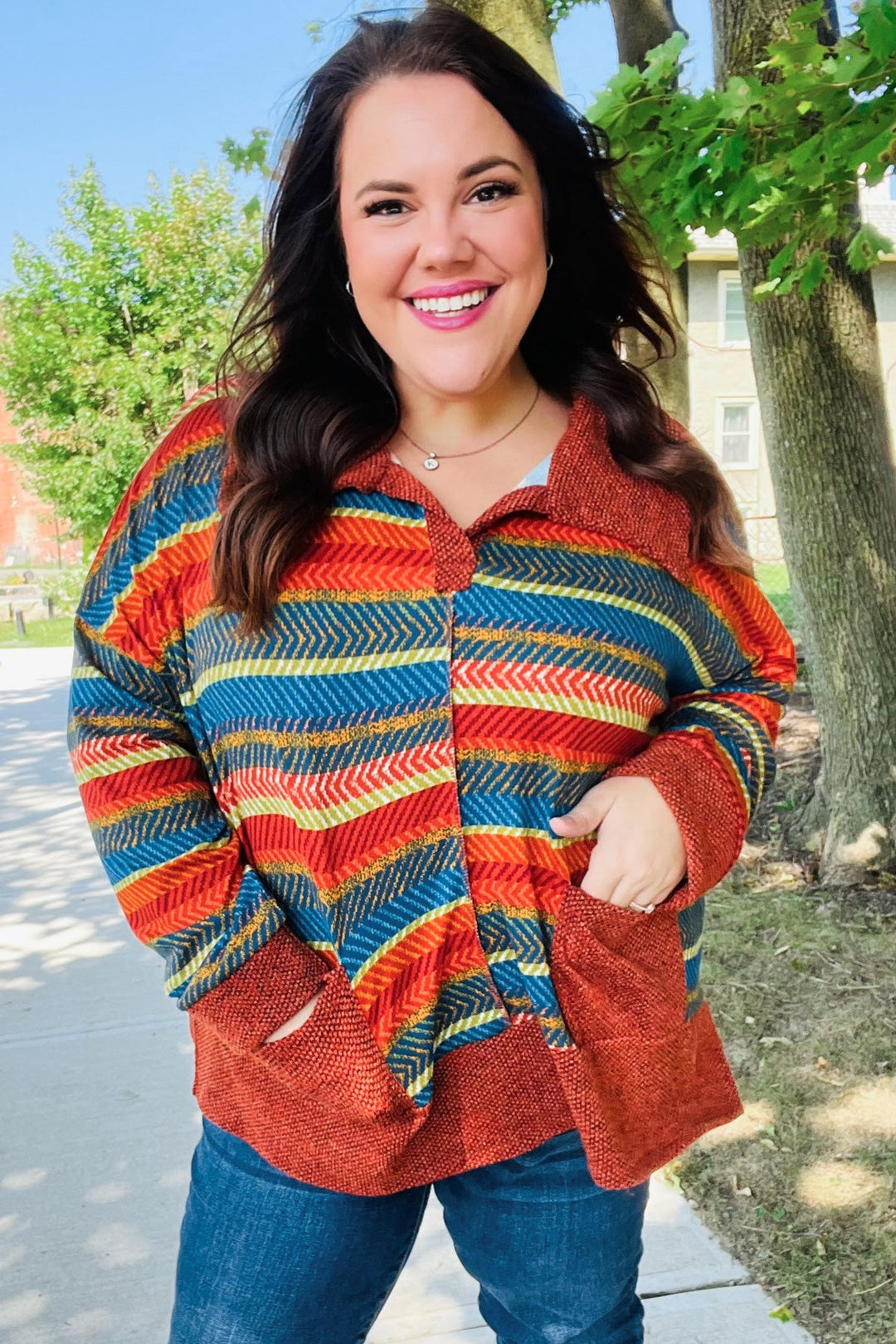 Casual Living Rust & Teal Striped Two Tone Knit Pocketed Top | Nikki & Co. Boutique