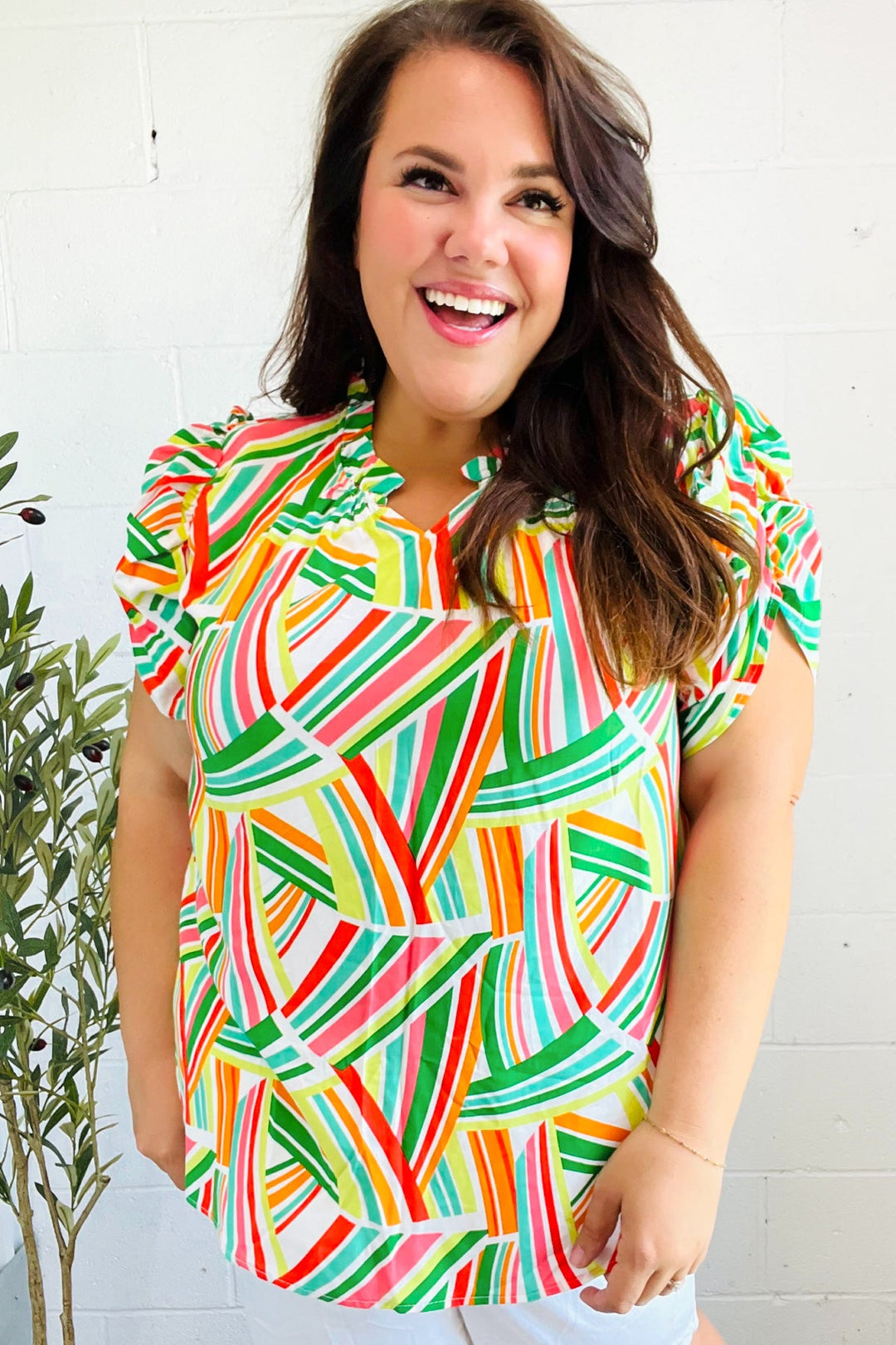 Hello Beautiful Green &amp; Orange Geo Frill Notch Neck Puff Sleeve Tops | Nikki &amp; Co. Boutique