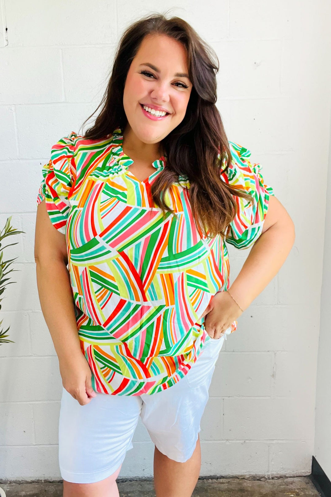 Hello Beautiful Green &amp; Orange Geo Frill Notch Neck Puff Sleeve Tops | Nikki &amp; Co. Boutique