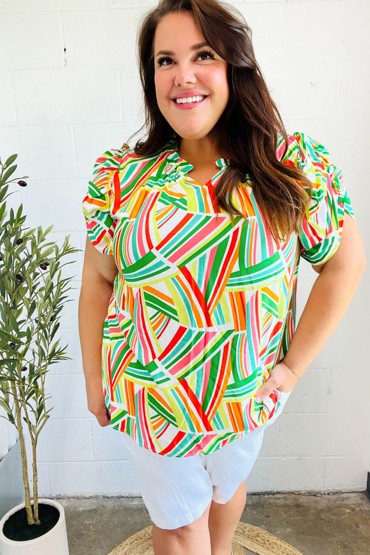Hello Beautiful Green &amp; Orange Geo Frill Notch Neck Puff Sleeve Tops | Nikki &amp; Co. Boutique