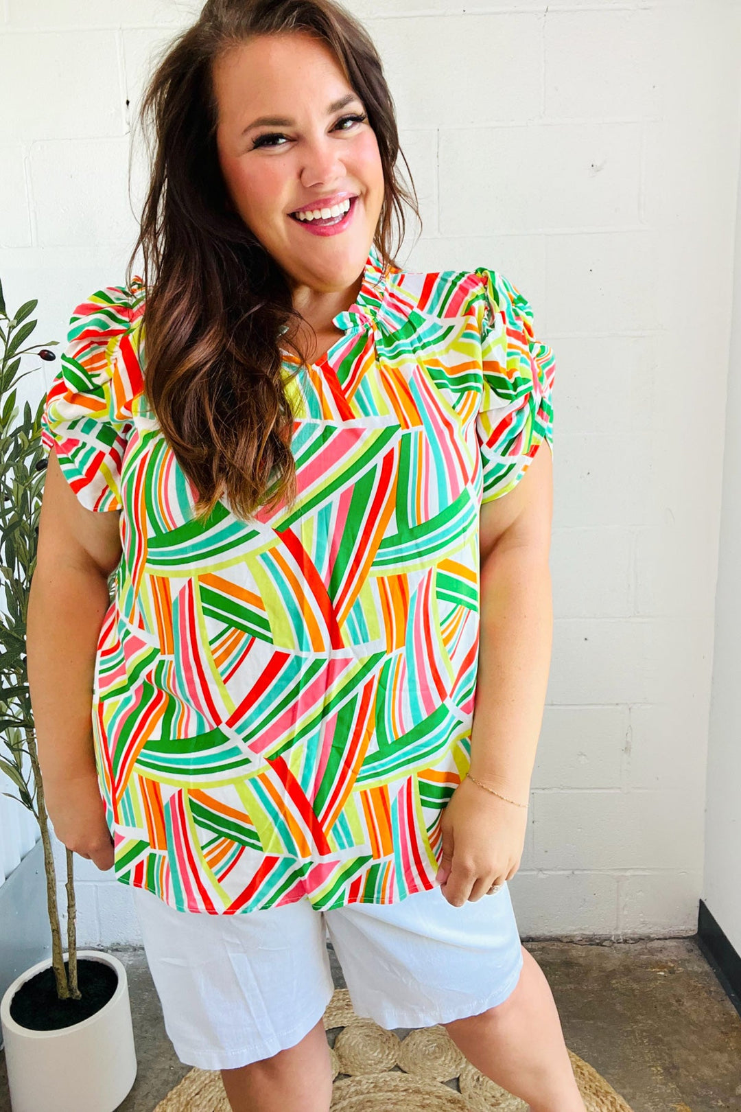 Hello Beautiful Green &amp; Orange Geo Frill Notch Neck Puff Sleeve Tops | Nikki &amp; Co. Boutique