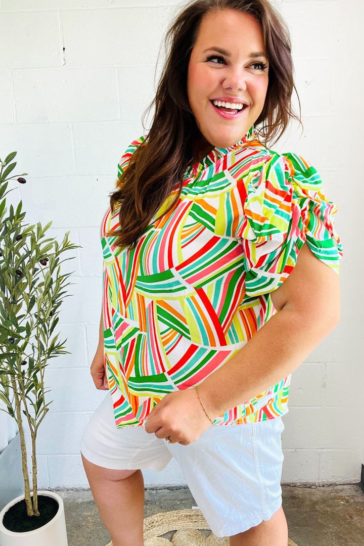 Hello Beautiful Green &amp; Orange Geo Frill Notch Neck Puff Sleeve Tops | Nikki &amp; Co. Boutique
