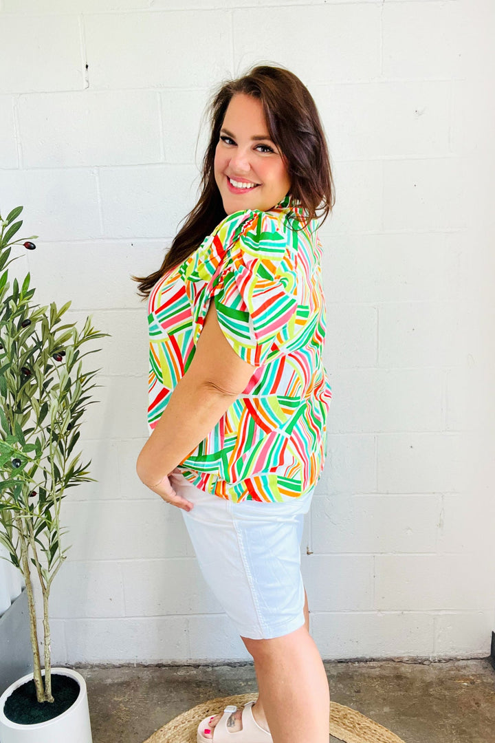 Hello Beautiful Green &amp; Orange Geo Frill Notch Neck Puff Sleeve Tops | Nikki &amp; Co. Boutique