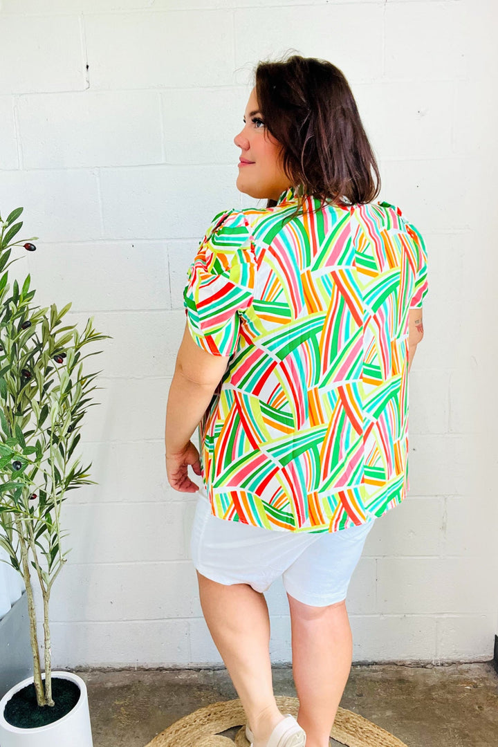 Hello Beautiful Green &amp; Orange Geo Frill Notch Neck Puff Sleeve Tops | Nikki &amp; Co. Boutique