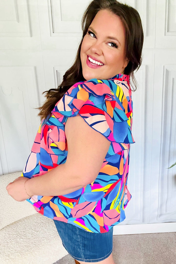 Tropical Vibes Blue &amp; Pink Mock Neck Flutter Sleeve Tops | Nikki &amp; Co. Boutique