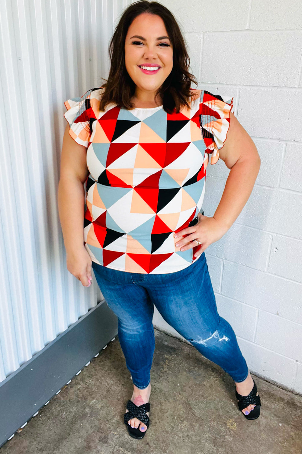 Burnt Orange Geo Print Smocked Ruffle Frill Sleeve Tops | Nikki &amp; Co. Boutique