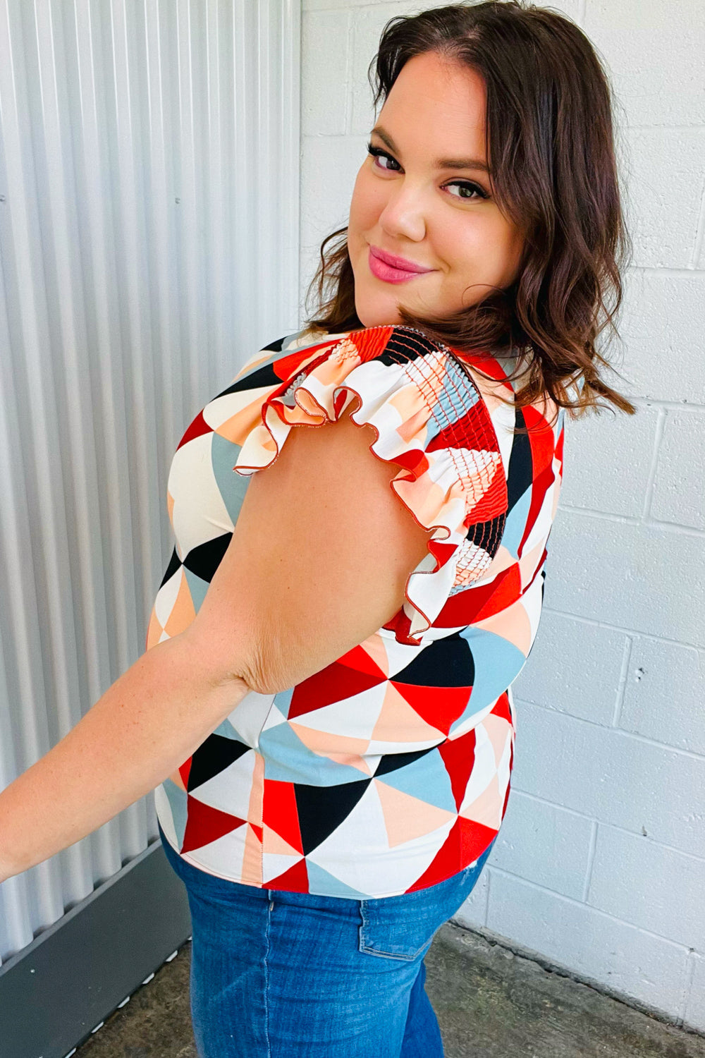 Burnt Orange Geo Print Smocked Ruffle Frill Sleeve Tops | Nikki &amp; Co. Boutique