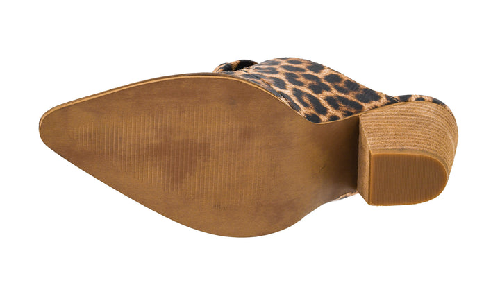 Close-up of a brown boot with a leopard print trim on a white background