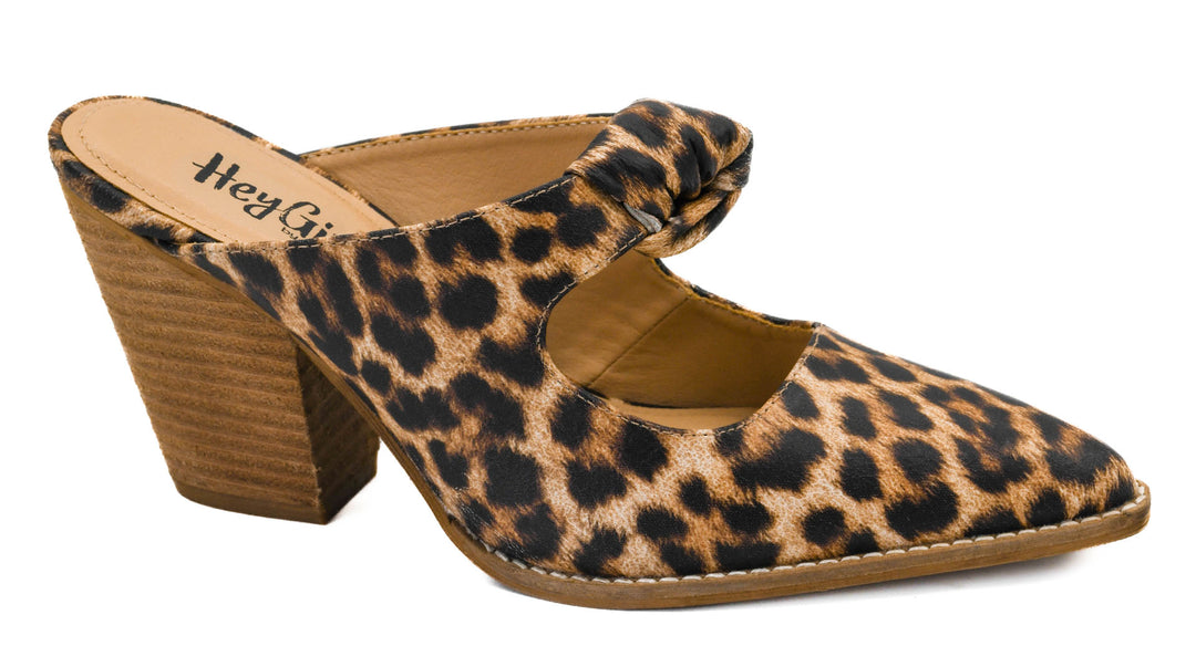 Leopard print high-heeled shoe on a white background