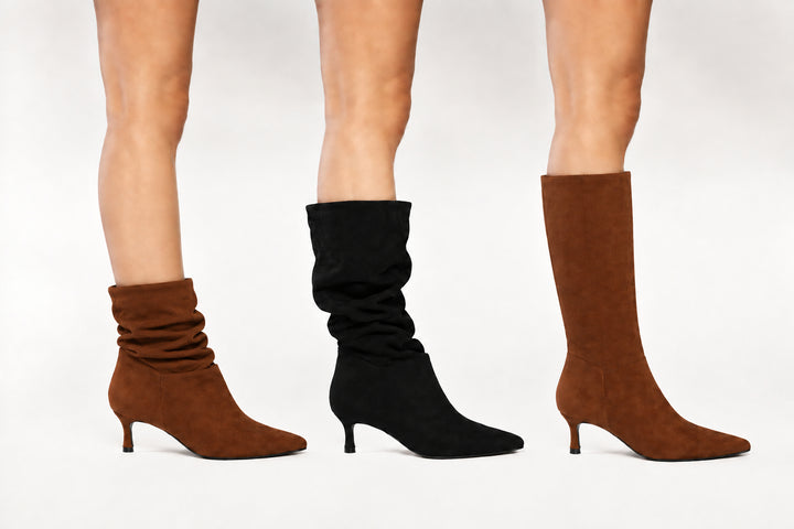Three knee-high heeled boots worn on model legs against a light gray studio background: a red suede boot, a brown leopard-print slouch boot, and a medium brown suede slouch boot.