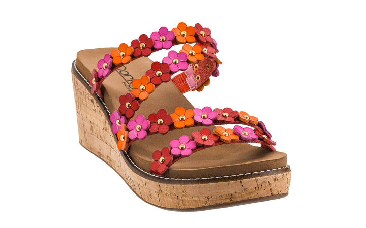 Wedge sandal with colorful flower straps on a white background
