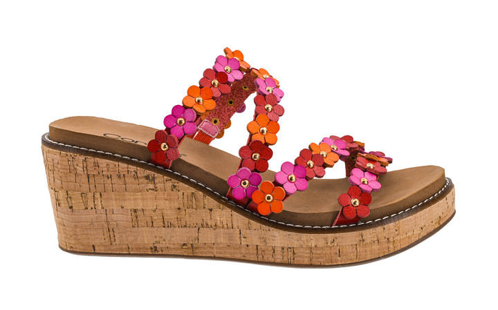 Wedge sandal with colorful flower decorations on a white background