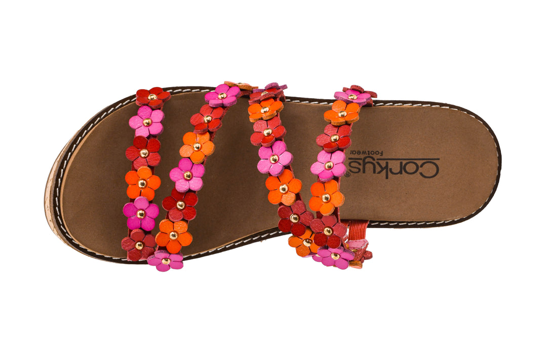 Brown sandal with colorful flower decorations on a white background