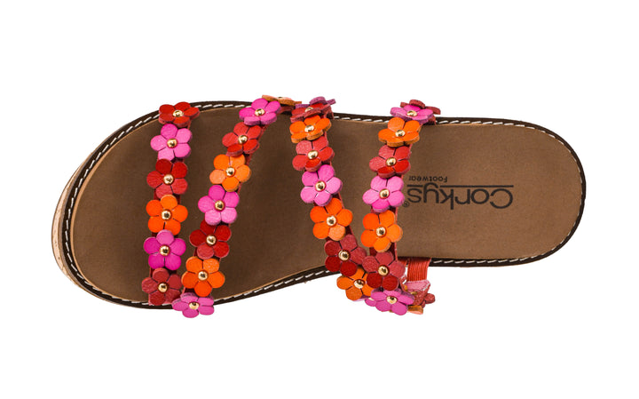 Brown sandal with colorful flower decorations on a white background