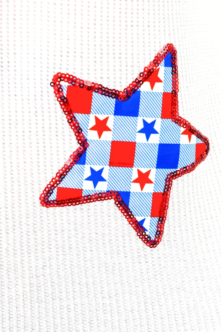 Star-shaped patch with red, white, and blue pattern on a white background