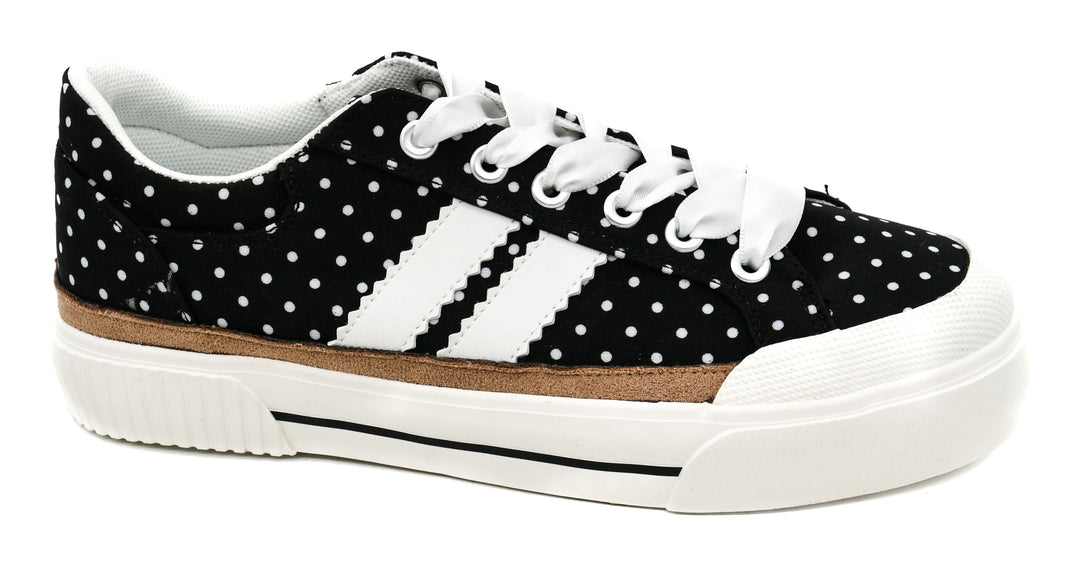 Black sneaker with white polka dots and stripes on a white background