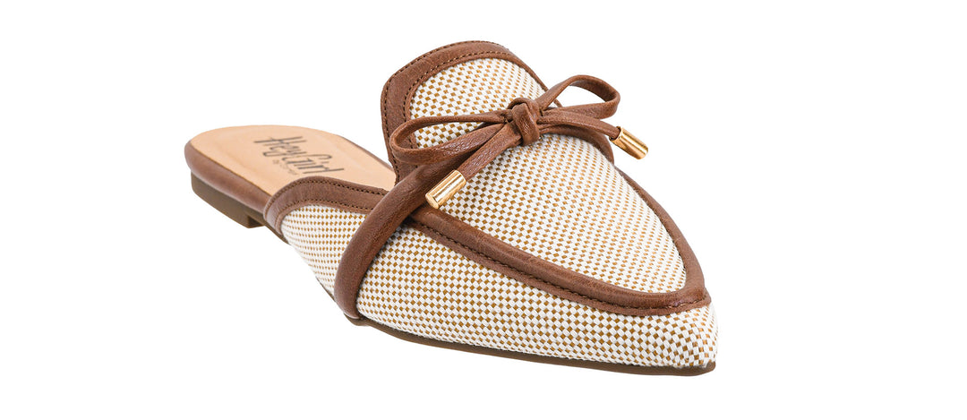 Beige slip-on shoe with brown mesh design and bow on a white background