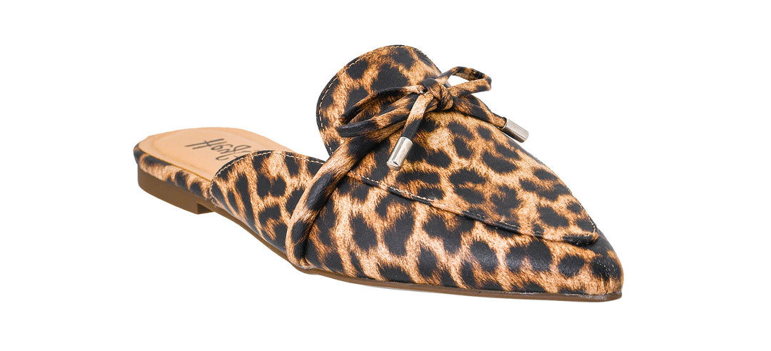 Leopard print slip-on shoe with a bow on a white background