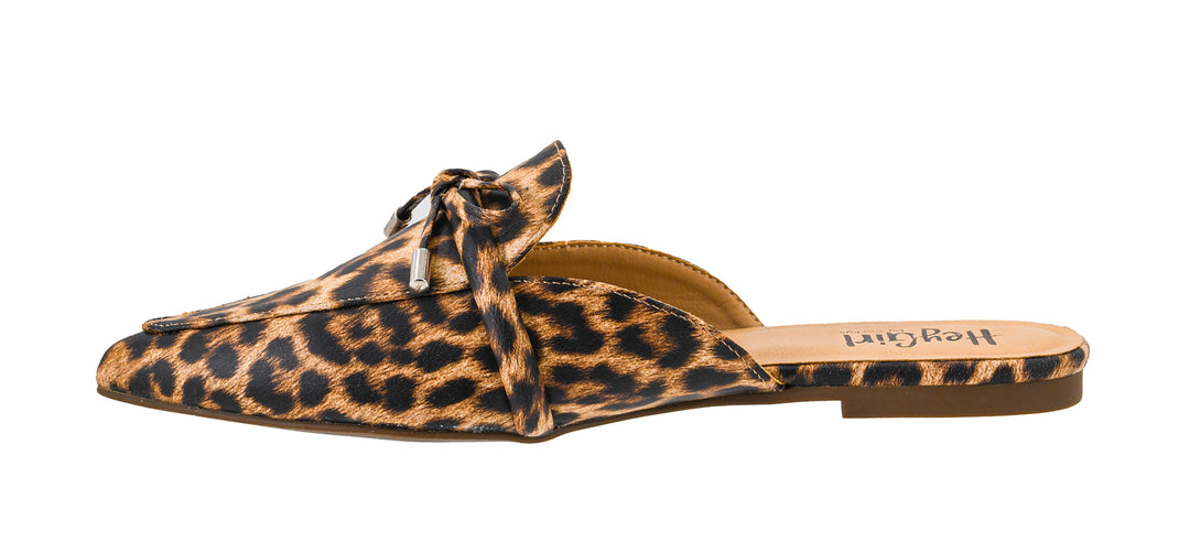Leopard print slip-on shoe with a wooden sole on a white background