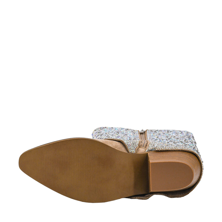 Bottom, sole, view. A single western-style cowboy boot with a beige suede foot and stacked block heel, covered in sparkling rhinestone embellishments on the shaft, and featuring a central zipper, shown against a plain white background.
