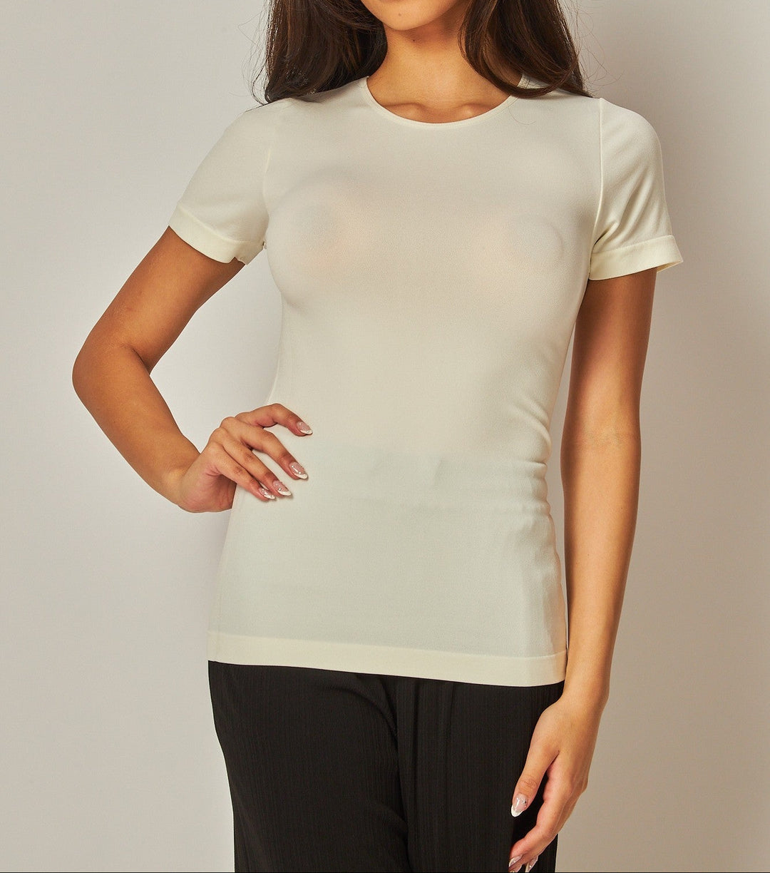 Seamless round neck short sleeve top in White, available in S/M and L/XL, front view. Seamless Round Neck, Shorts Sleeve Top (NP) - 4 Core colors | Nikki &amp; Co. Boutique