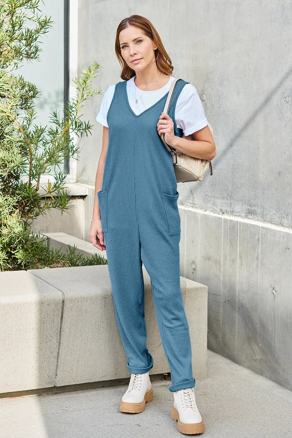 Waffle-Knit Sleeveless V-Neck Jumpsuit with Pockets - Nikki &amp; Co. Boutique