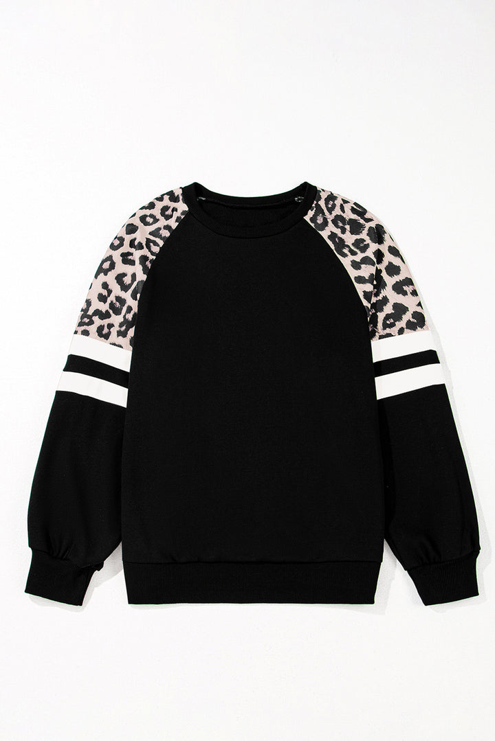 Black sweatshirt with leopard print sleeves on a white background