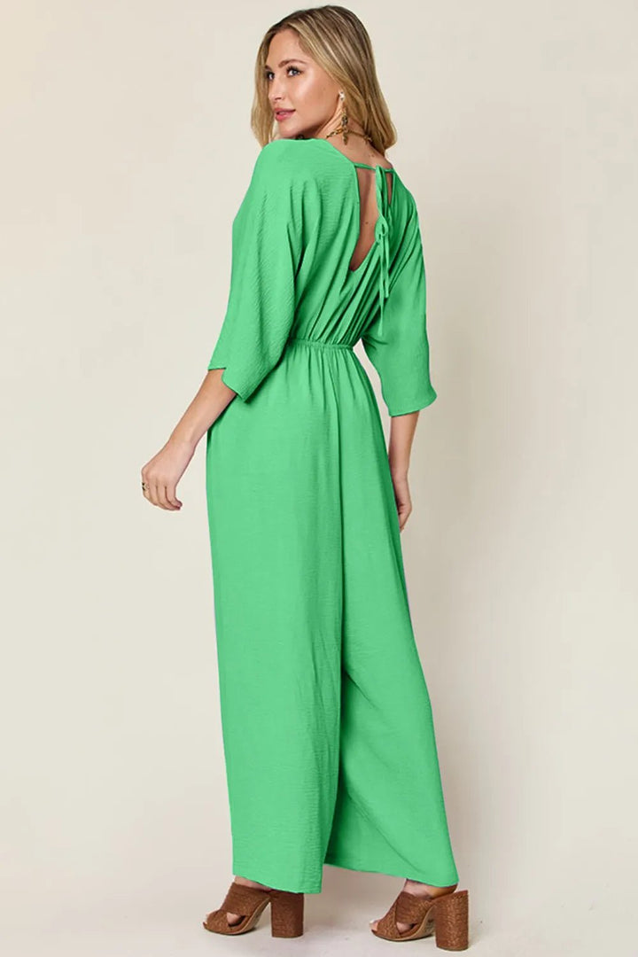 Double Take Full Size Surplice Wide Leg Jumpsuit with Pockets | Nikki &amp; Co. Boutique