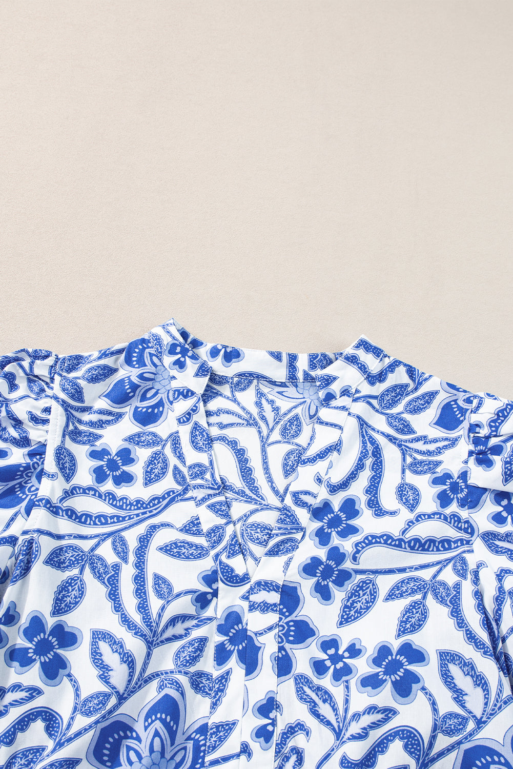 Blue floral pattern on a white background