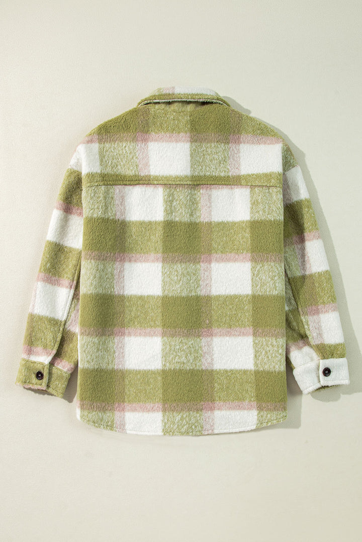 Green and white plaid shirt on a beige background