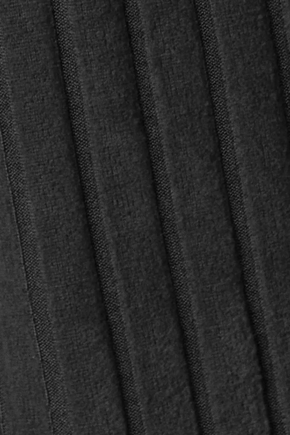Close-up of dark gray fabric with visible texture