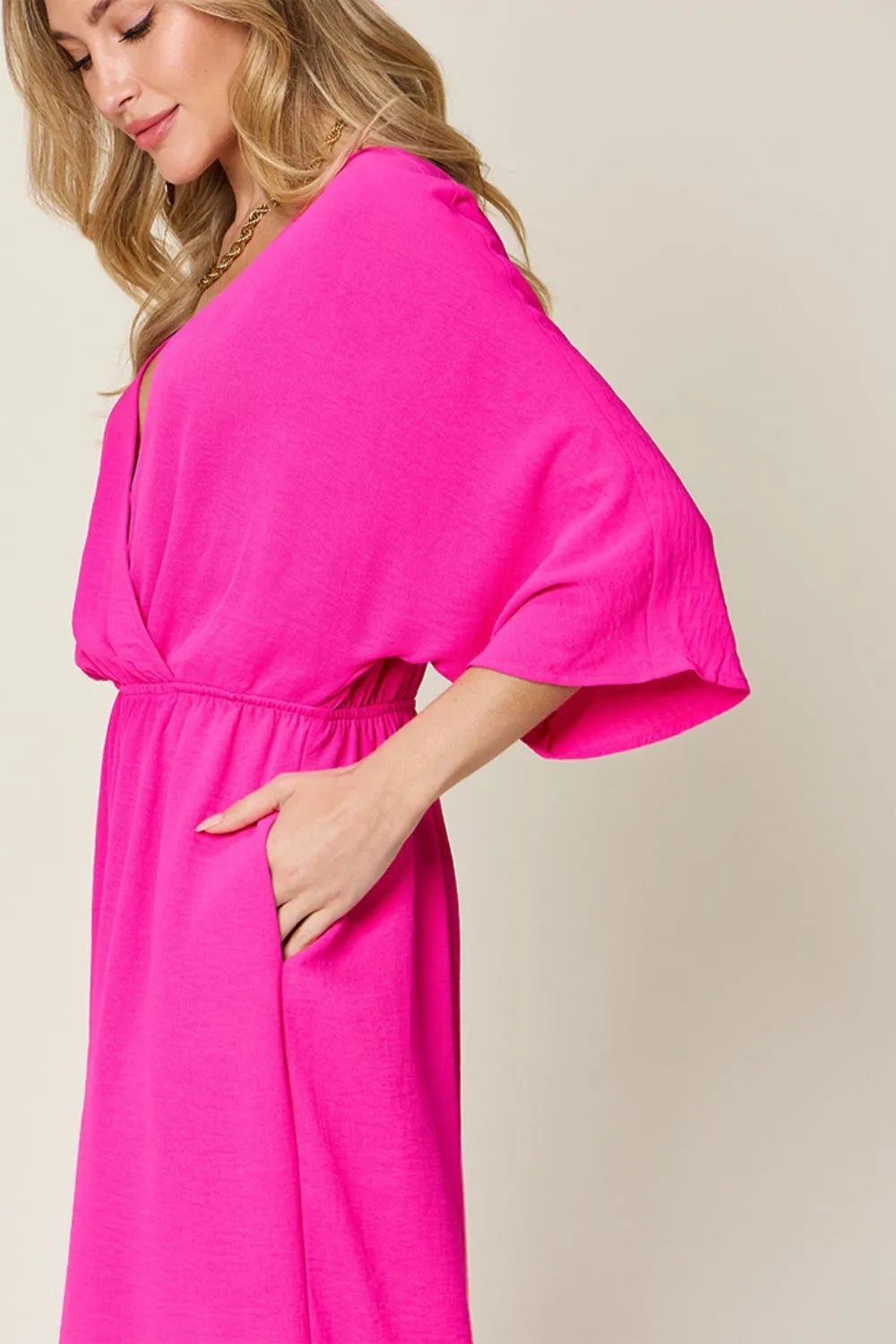 Double Take Full Size Surplice Wide Leg Jumpsuit with Pockets | Nikki &amp; Co. Boutique