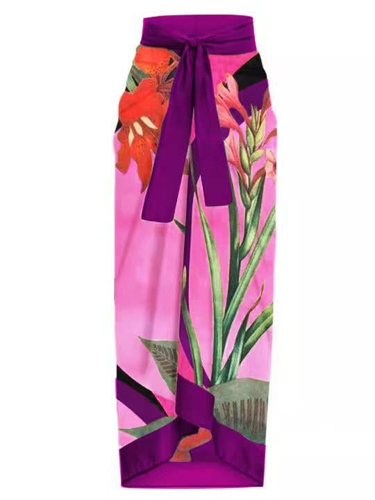 Colorful floral skirt with a purple belt on a white background