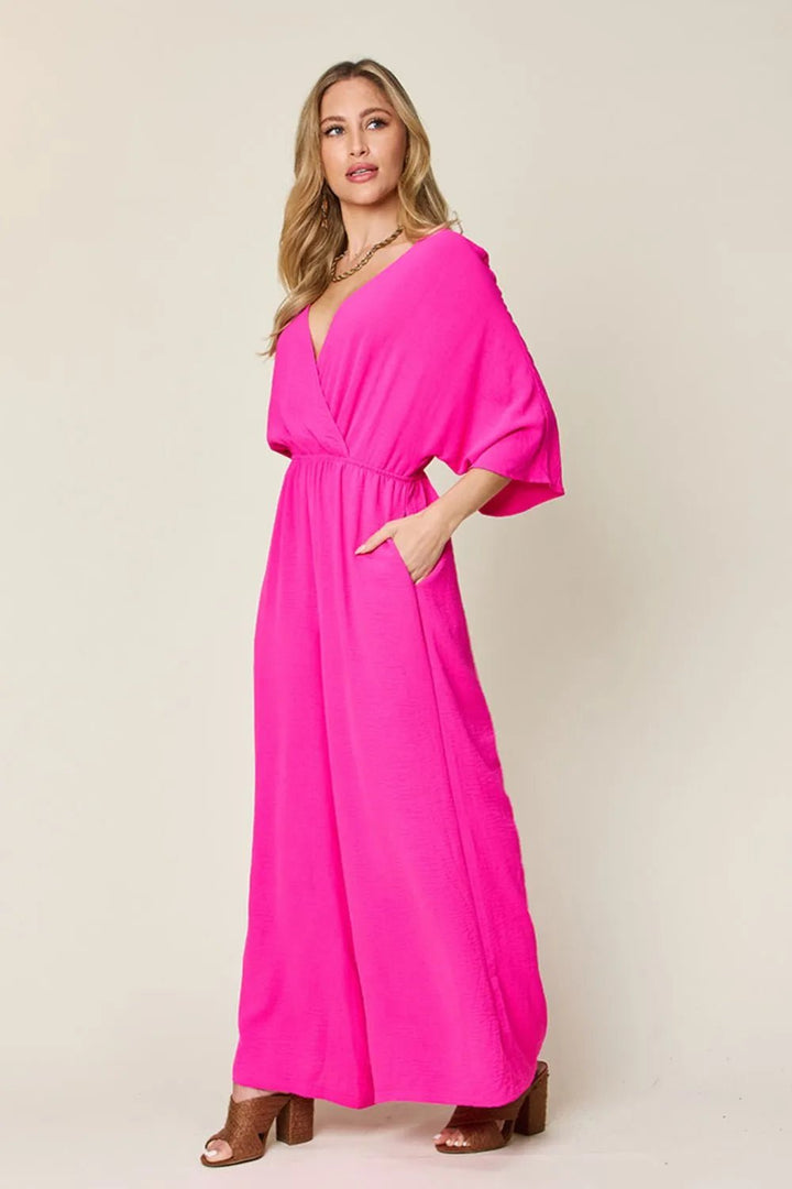 Double Take Full Size Surplice Wide Leg Jumpsuit with Pockets | Nikki &amp; Co. Boutique