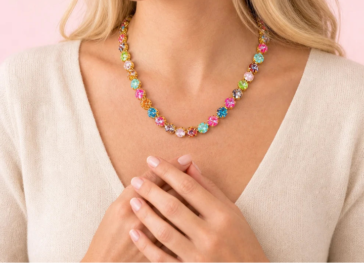 Woman wearing multicolored gemstones necklace