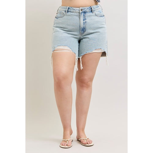 Light blue denim shorts worn by a person on a plain background