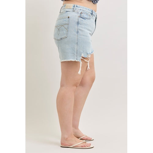 Light blue denim skirt worn by a person on a plain background